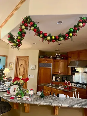 A seasonal garland above an archway