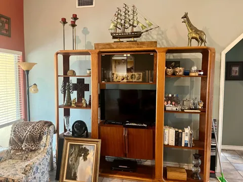 Wood display cabinets and meaningful collections